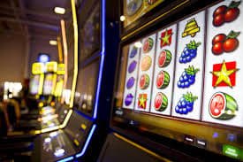 Filipino player using the casino score app on a smartphone to browse the slots lobby